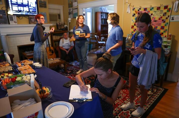 Mack Thompson, center, welcomes fellow students back to campus at the UK Appalachian Center's Welcome Back Open House on Friday, Sept. 6. Carter Skaggs | UK Photo